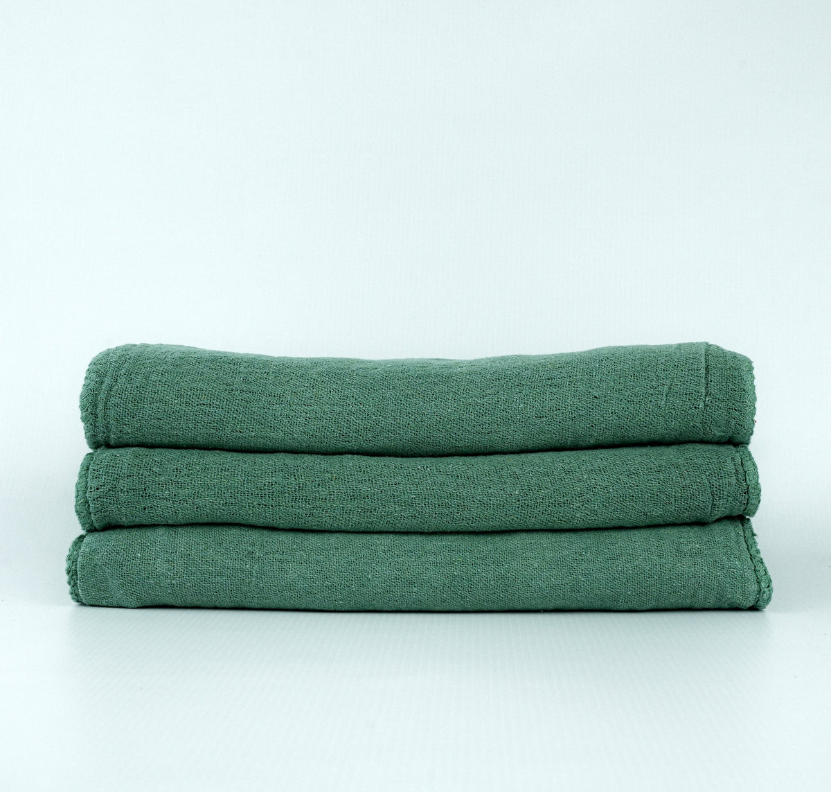 Manufacturer photograph of green dyed shop towels; shared color-family image.