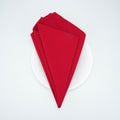 Red 20x20 spun polyester napkin. Plate shown for presentation; plate is not included.