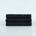 HR Cotton black 16x27 vat-dyed ring-spun hand towel. Supplier product photograph.