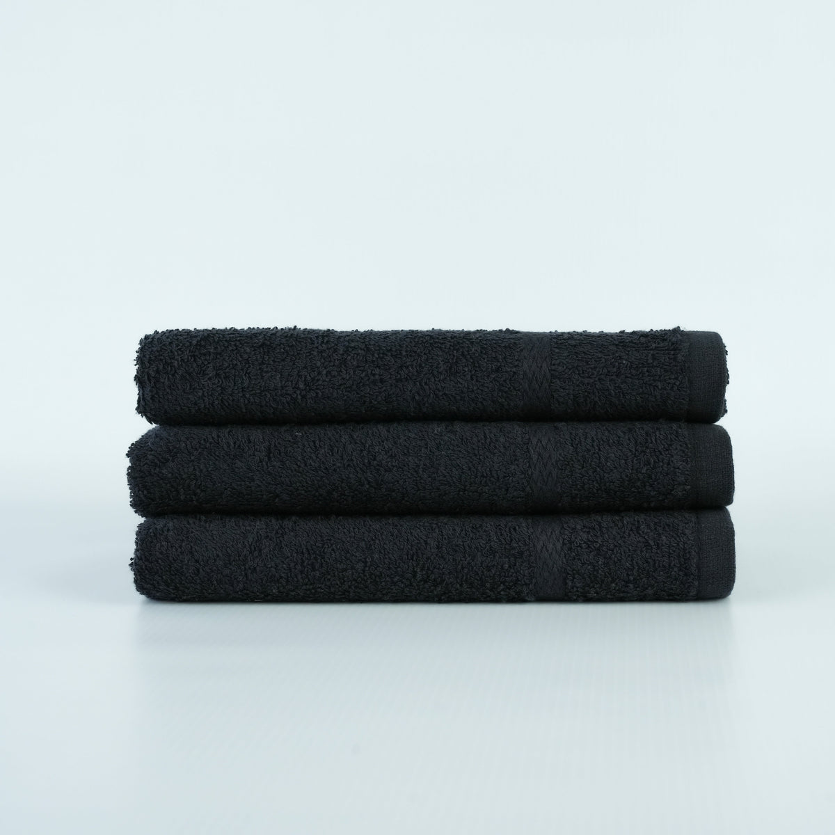 HR Cotton black 16x27 vat-dyed ring-spun hand towel. Supplier product photograph.