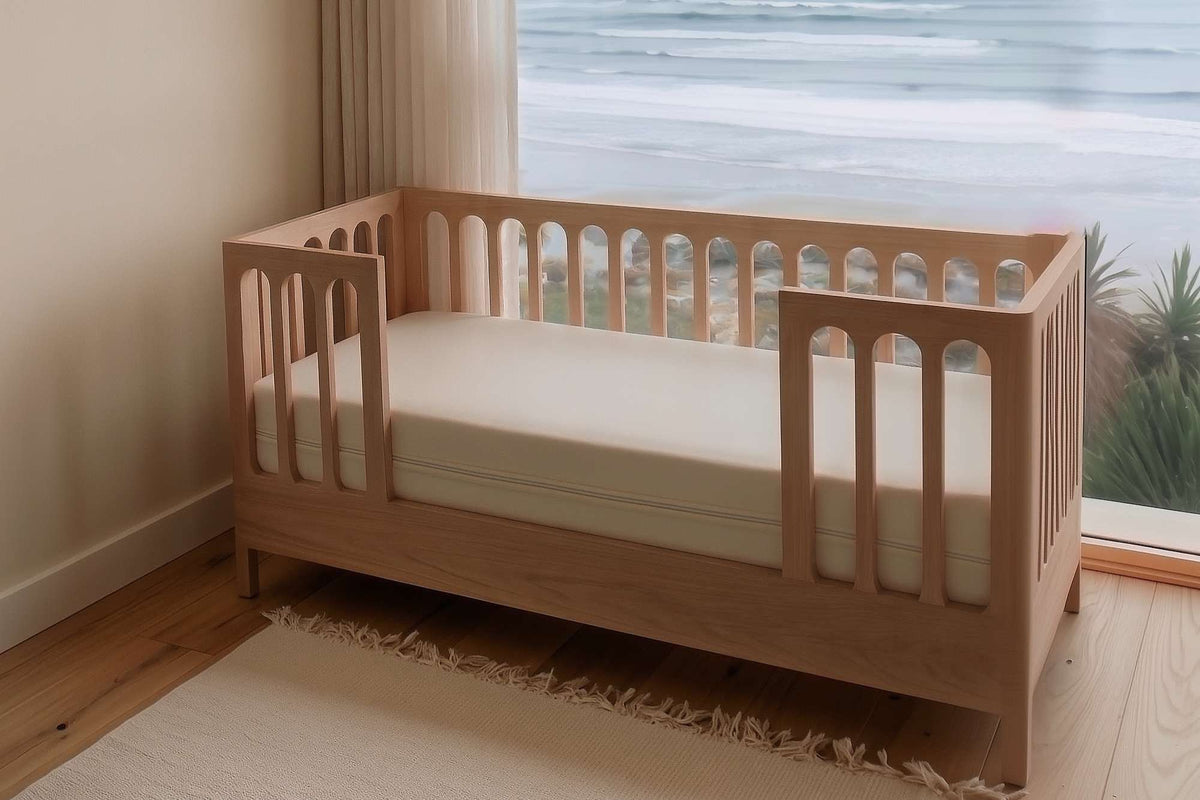 Sleep & Beyond Organic Cotton Waterproof Mattress Encasement. Supplier family gallery explicitly contains this crib/color image. Styling only; only SKU contents included.