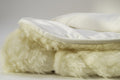 Sleep & Beyond myDual Reversible Mattress Pad. Supplier construction close-up, not a full-size crib product photograph. Size and included pieces are defined by the selected SKU.